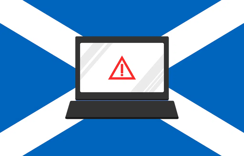 Laptop warning with Scottish Flag background